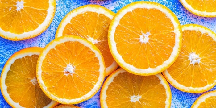 Orange slices blue background