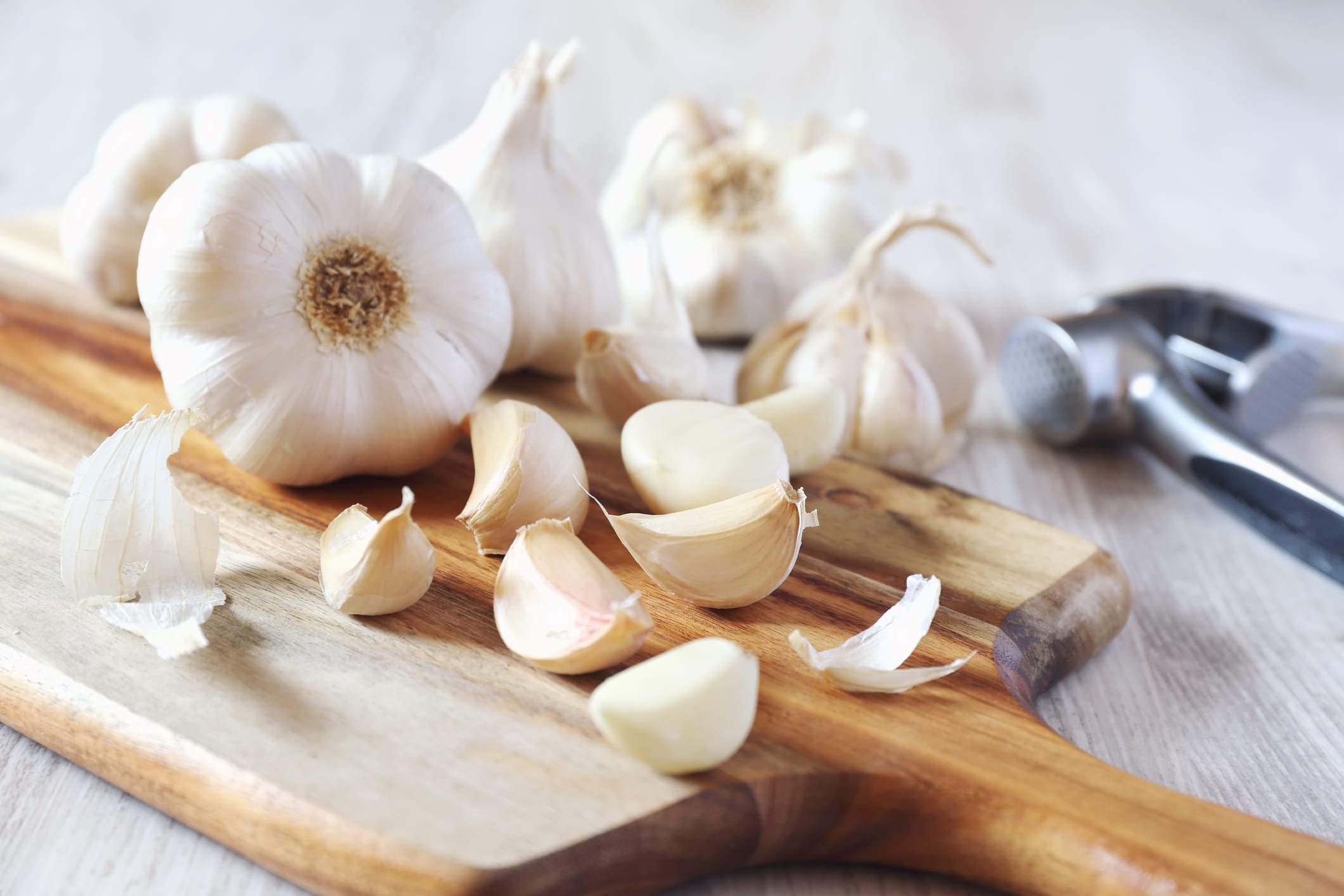 Garlic cloves on cutting boad