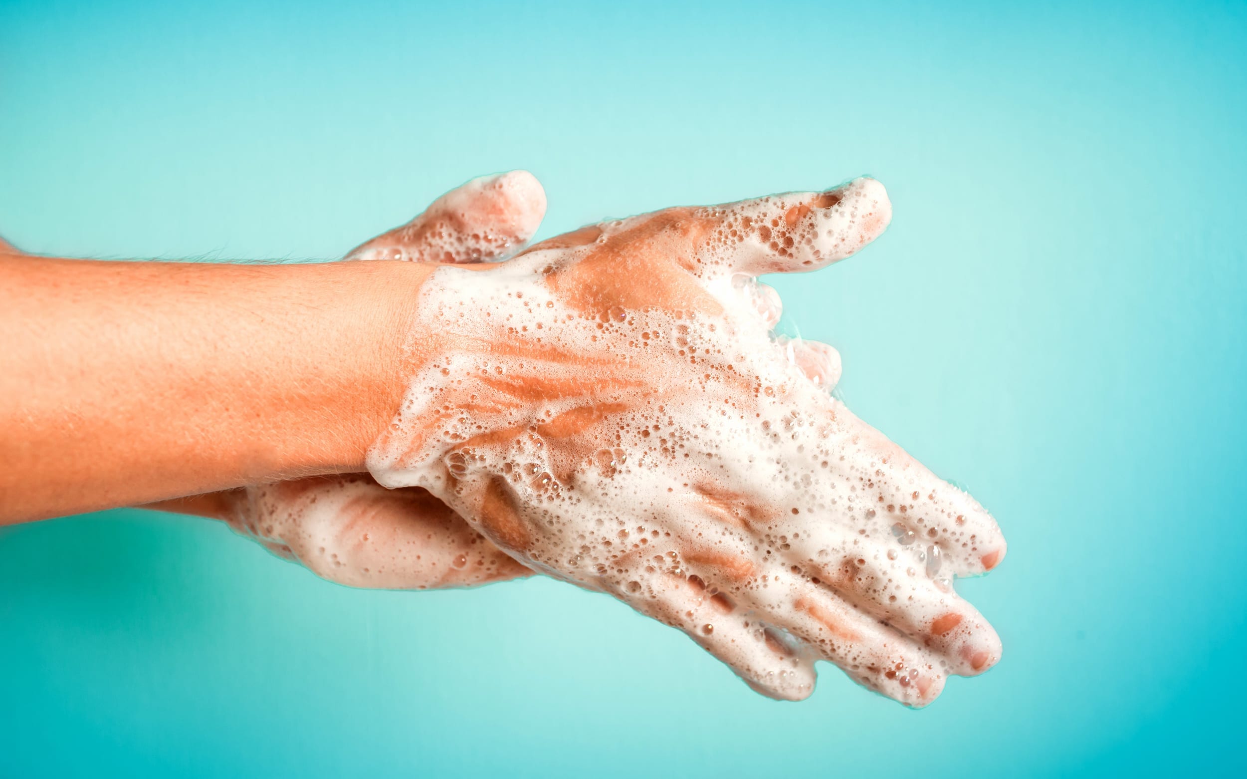 washing hands blue background