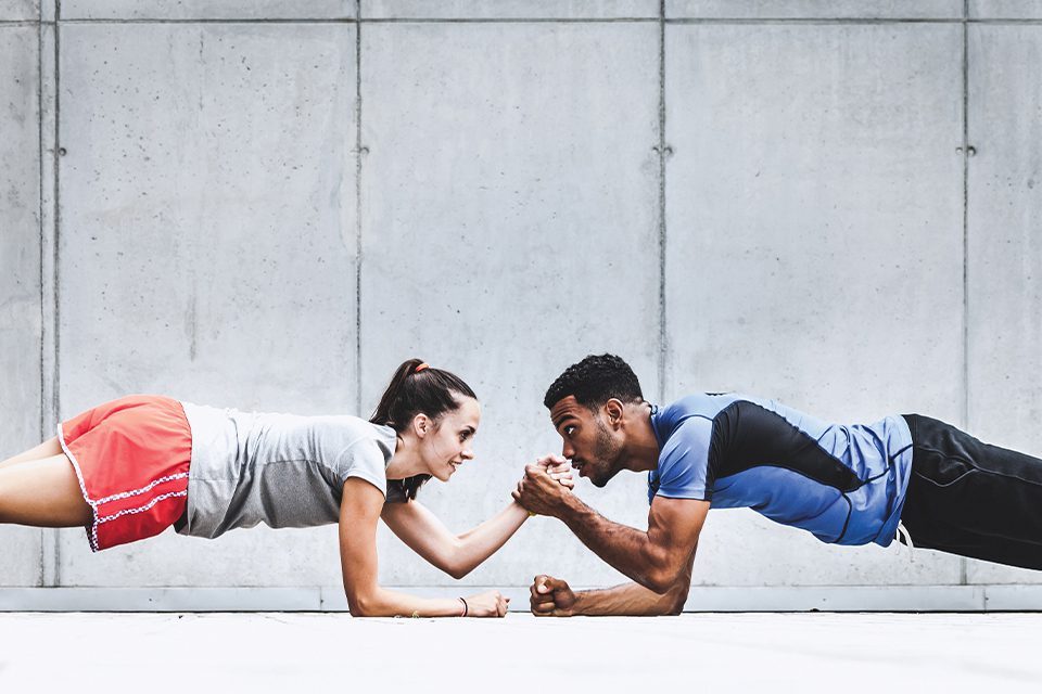 woman and man exercising together